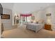 Comfortable bedroom features a fireplace, accent lighting, and cozy decor at 65 Royal Ann Dr, Englewood, CO 80111