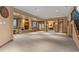 Spacious living room with stone fireplace, large windows, and elegant decor at 65 Royal Ann Dr, Englewood, CO 80111