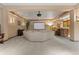 Spacious living room features home theatre, large sofa, and bar area, perfect for entertaining at 65 Royal Ann Dr, Englewood, CO 80111