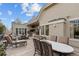 Expansive outdoor patio with a built-in bar, dining area, and lounge seating, ideal for outdoor gatherings at 65 Royal Ann Dr, Englewood, CO 80111