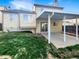 Backyard with a patio and small lawn at 2875 S Espana Ct, Aurora, CO 80013