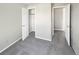 Spacious bedroom with neutral colors, carpeted floor, and closet at 2875 S Espana Ct, Aurora, CO 80013