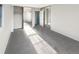 Bright and airy bedroom featuring mirrored closet doors at 2875 S Espana Ct, Aurora, CO 80013