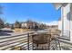 Open balcony provides seating with community views and plenty of sunshine on a beautiful day at 888 S Valentia St # 104, Denver, CO 80247
