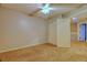 Bedroom with carpet, ceiling fan, closet and entrance to a bedroom and sky light at 10320 E Jewell Ave # 63, Aurora, CO 80247