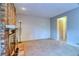 Bright living room with brick fireplace, and neutral carpeting at 10320 E Jewell Ave # 63, Aurora, CO 80247