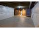 Unfinished basement space with visible beams and wrapped pillars offer a wealth of possibilities at 8791 Culebra Ct, Arvada, CO 80007