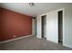 Comfortable bedroom with new carpet, closet, and large windows providing natural light at 8791 Culebra Ct, Arvada, CO 80007