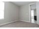 Cozy bedroom with neutral carpet, a window and an en-suite bathroom at 8791 Culebra Ct, Arvada, CO 80007