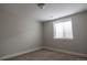 This bedroom features neutral paint and carpet, one window, and recessed ceiling lights at 8791 Culebra Ct, Arvada, CO 80007