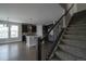 Open kitchen with white island, black cabinetry, and modern appliances at 8791 Culebra Ct, Arvada, CO 80007