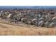 A high angle view of rooftops and homes in a suburban community near downtown at 8791 Culebra Ct, Arvada, CO 80007