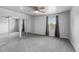 Bedroom features sliding door closet, carpeted floor and a window at 7665 E Eastman Ave # 301A, Denver, CO 80231