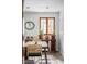 Cozy dining room featuring a wood table and plants near a window at 26288 S End Rd, Kittredge, CO 80457