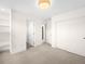 Bright bedroom with built-in shelving and closets at 5360 Allison St # D, Arvada, CO 80002