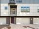 Modern townhome exterior with two-car garage at 5360 Allison St # D, Arvada, CO 80002