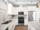 Modern kitchen with stainless steel appliances at 5360 Allison St # D, Arvada, CO 80002