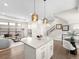 Open concept kitchen and living area at 5360 Allison St # D, Arvada, CO 80002