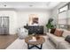 Bright and airy living room with hardwood floors and large windows at 5360 Allison St # D, Arvada, CO 80002
