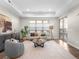 Living room with hardwood floors and large windows at 5360 Allison St # D, Arvada, CO 80002