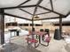 Community patio with covered seating and grill at 5360 Allison St # D, Arvada, CO 80002