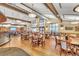Spacious dining area featuring hardwood floors, high ceilings, and ample seating at 14390 E Marina Dr # 606, Aurora, CO 80014
