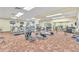 Well-equipped gym with treadmills, elliptical machines, weights, and mirrored walls at 14390 E Marina Dr # 606, Aurora, CO 80014