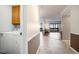 Inviting interior featuring an in-unit washer/dryer and living area with access to an outdoor balcony at 14390 E Marina Dr # 606, Aurora, CO 80014