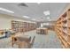 A well-stocked library with shelves of books, comfortable seating, and ample lighting at 14390 E Marina Dr # 606, Aurora, CO 80014