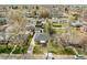 Aerial view of a home highlighting backyard and mature trees surrounding the property at 4433 S Washington St, Englewood, CO 80113