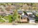 Aerial view of a home showing a fenced backyard, mature trees, and the roof's condition at 4433 S Washington St, Englewood, CO 80113