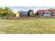 Sign for Downtown Littleton with beautifully maintained green grass at 4433 S Washington St, Englewood, CO 80113