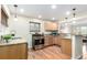 Bright kitchen featuring stainless steel appliances, granite countertops, and an open design at 4433 S Washington St, Englewood, CO 80113