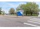 Cornerstone Park sign with lush trees and blue sky, inviting you to explore nature at 4433 S Washington St, Englewood, CO 80113