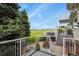 Multiple decks and outdoor seating provide ample space to enjoy serene backyard and expansive green landscape at 3973 Palmer Ridge Dr, Parker, CO 80134