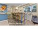 Basement bar area offers a colorful and fun space for entertaining and relaxation at 3973 Palmer Ridge Dr, Parker, CO 80134