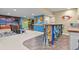 Full view of the basement that shows an at-home cinema room, a bar area, and unique design at 3973 Palmer Ridge Dr, Parker, CO 80134