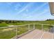 Outdoor deck with clear railing and stunning panoramic views at 3973 Palmer Ridge Dr, Parker, CO 80134