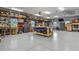 Spacious three-car garage with ample storage and work space at 3973 Palmer Ridge Dr, Parker, CO 80134