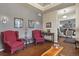 Inviting living room showcasing beautiful hardwood floors, recessed lighting, and seamless flow to other areas at 3973 Palmer Ridge Dr, Parker, CO 80134