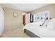 Cozy bedroom with plantation shutters, closet and view of backyard at 9025 Rocky Mountain Ln, Parker, CO 80138