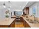Well-equipped kitchen featuring granite countertops and modern stainless steel appliances at 9025 Rocky Mountain Ln, Parker, CO 80138