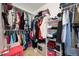 Organized walk-in closet with ample storage and shelving at 9025 Rocky Mountain Ln, Parker, CO 80138