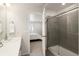 This bathroom features a sleek vanity, tiled shower, and natural light for a spa-like experience at 11228 Bella Vita Dr, Broomfield, CO 80020