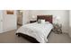 Cozy bedroom featuring a comfortable bed, bedside tables, and an ensuite bathroom, creating a private retreat at 11228 Bella Vita Dr, Broomfield, CO 80020