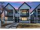 Modern two-story homes with black trim, balconies, and landscaped front yards at 2321 S Galapago St, Denver, CO 80223