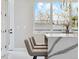 Kitchen island seating, quartz countertop, stainless steel appliances and natural light at 2321 S Galapago St, Denver, CO 80223