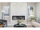 Bright living room boasting a sleek fireplace and comfortable seating arrangement at 2321 S Galapago St, Denver, CO 80223