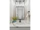 Powder room with granite countertop, modern sink, and decorative accents at 2321 S Galapago St, Denver, CO 80223