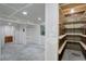 Unfinished basement with custom shelving and storage opportunities; ready for your special touch! at 5163 E 123Rd Ct, Thornton, CO 80241